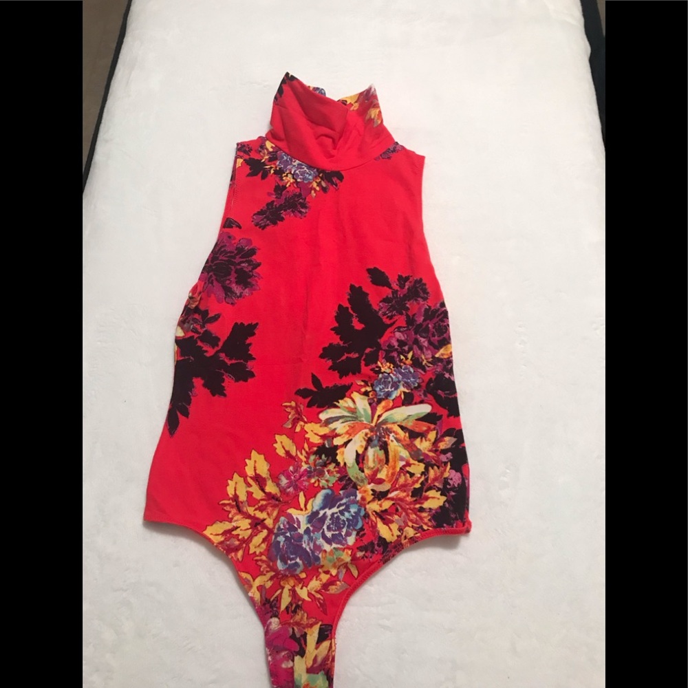 Woman’s Size Small Free People Onesie